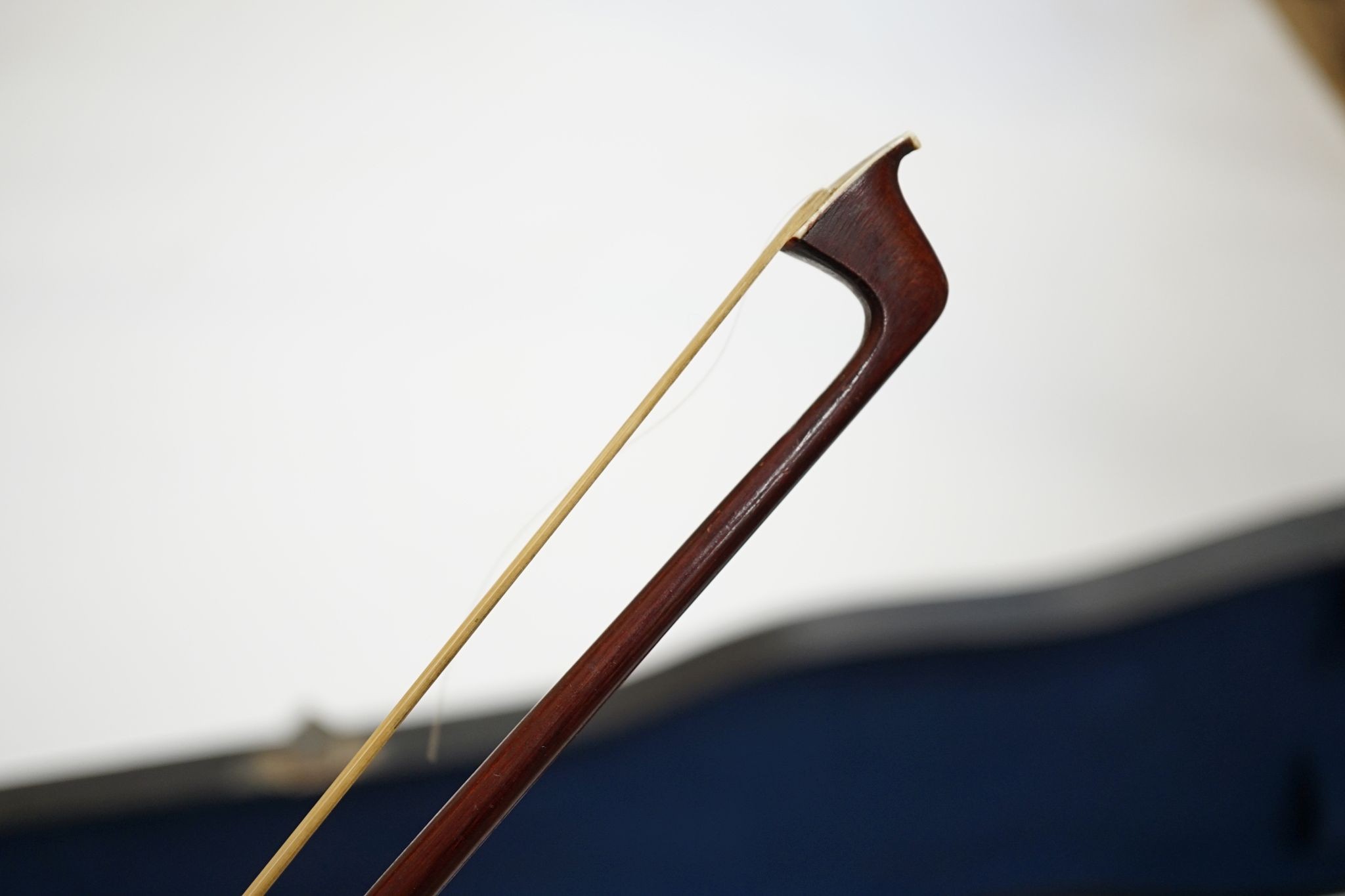 A Maidstone violin, with bow, cased., violin 59 cms high.